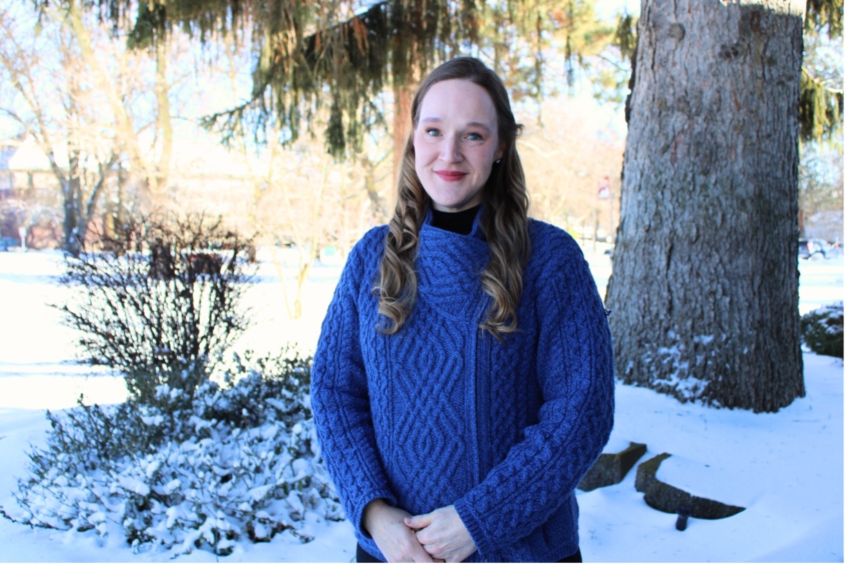 Sonya P., NIC Foundation scholarship recipient, poses for a photo outside