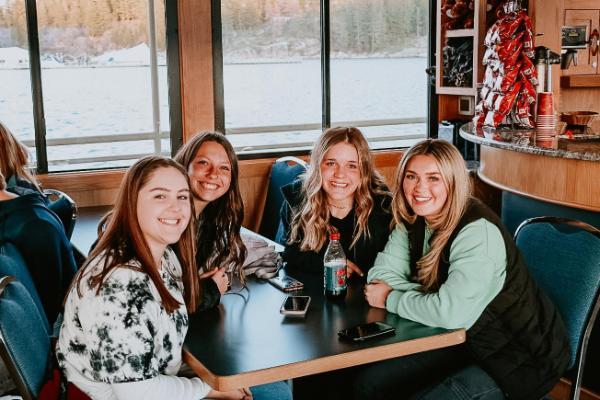 4 female students on Cardinal Cruise