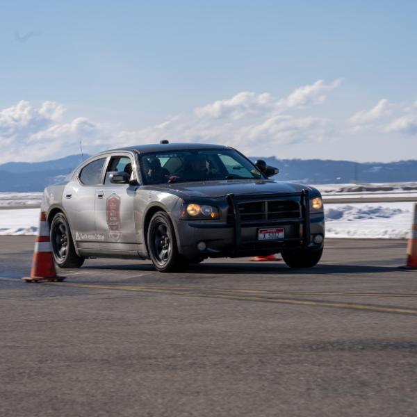 Law enforcement patrol car student driving on course