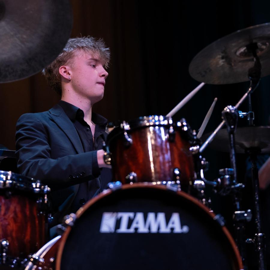 At Jazz ensemble concert student playing the drums