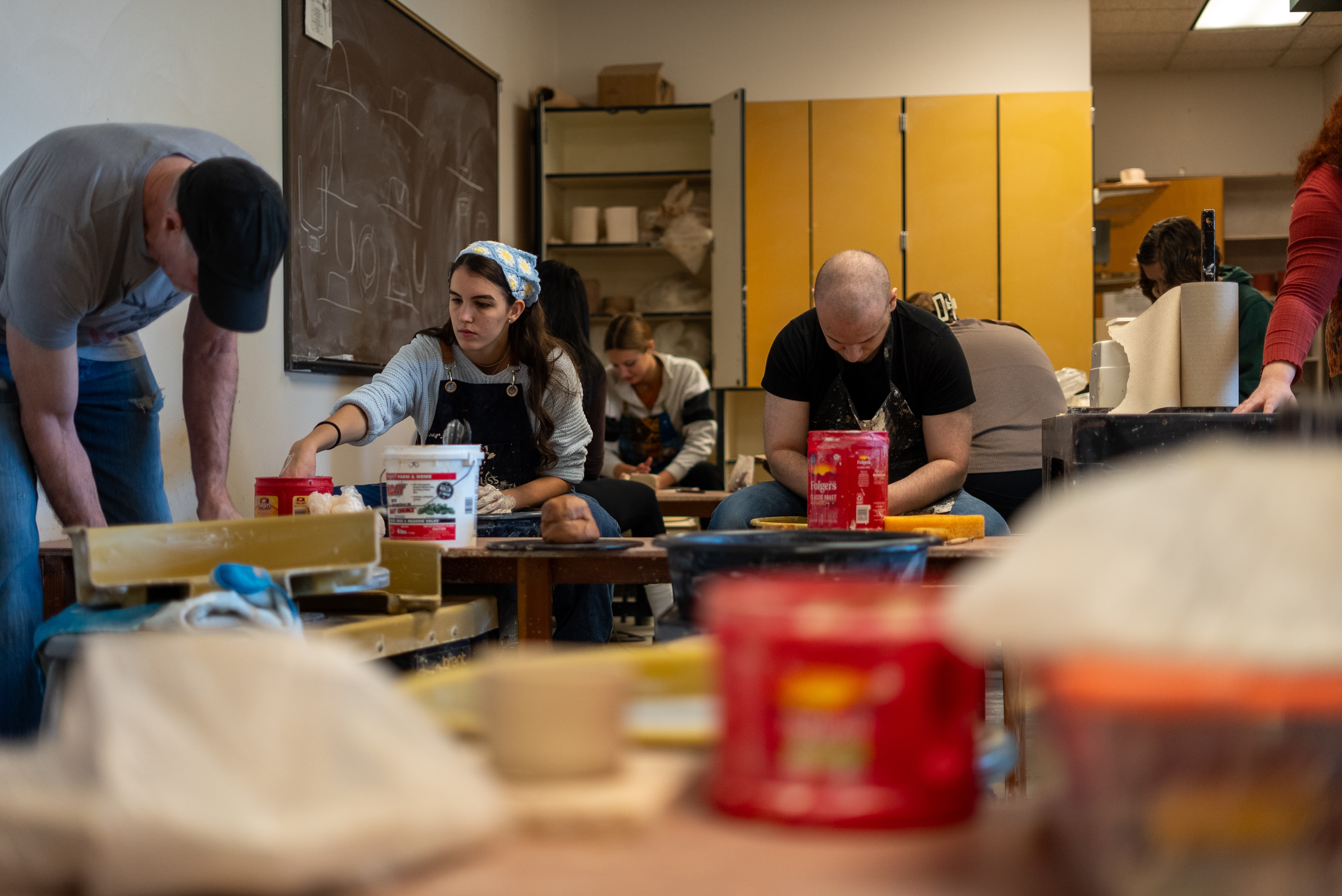 ceramics class students working with clay