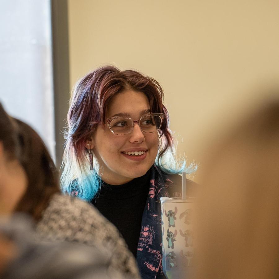 Student smiling in class