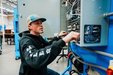 NIC Mechatronics student Logan Jones works in a lab on Feb. 13, 2023 at the NIC Parker Technical Education Center in Rathdrum.