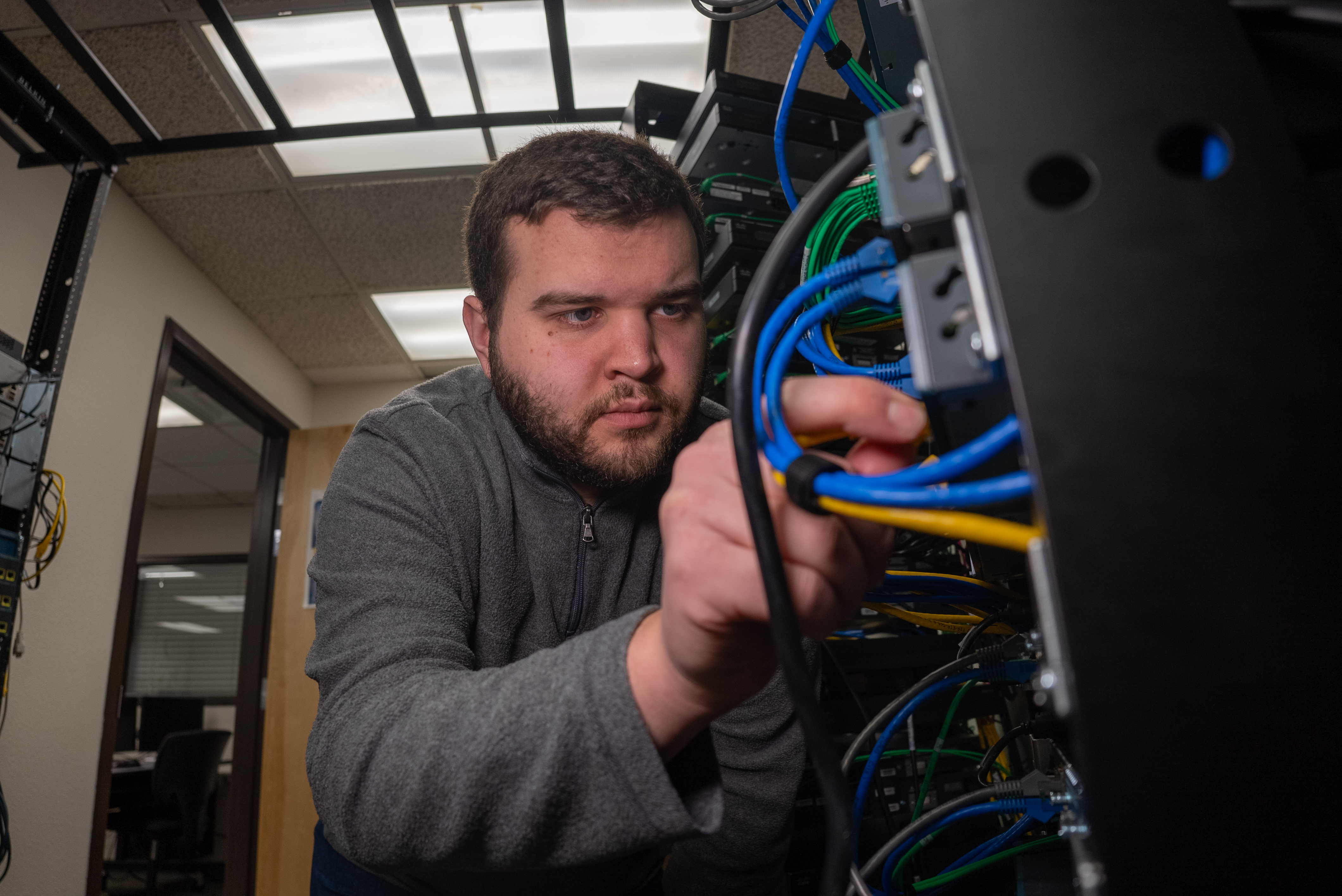 Student working on a mainframe computer
