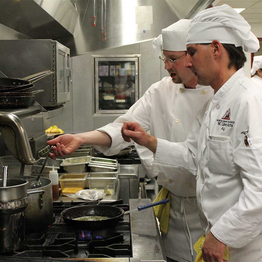 Culinary arts students working in the kitchen