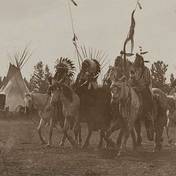 American Indian tribe on horseback